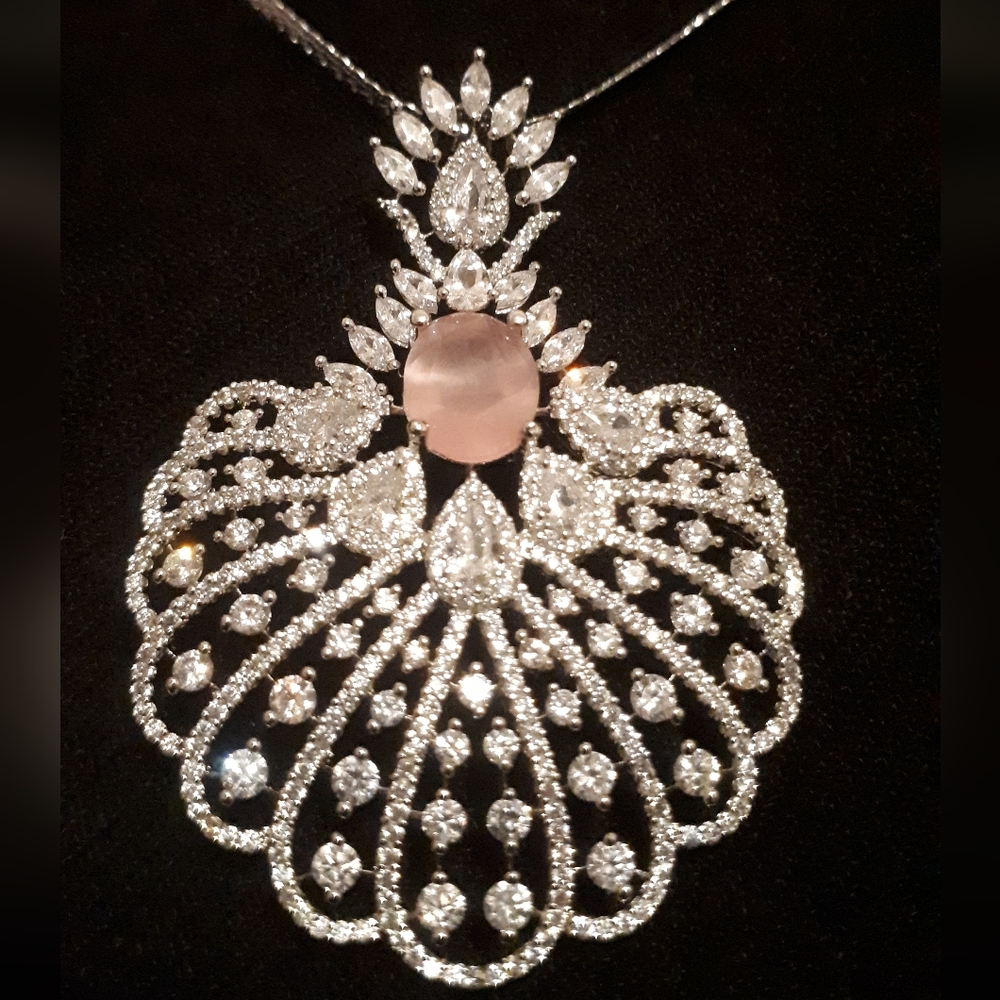 Necklace, silver chain with pendant .